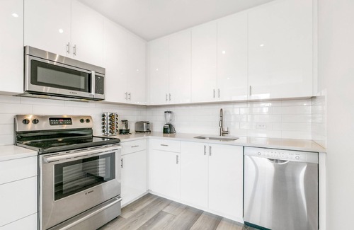 Central Business District Apartamento | Luxury 4 bedroom Condo Short Walk to Bourbon Street