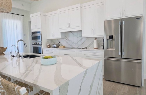 Treasure Cay Casa | Luxury 4 bedroom home on Ocean Blvd w/ private access to the beach. Sleeps 14