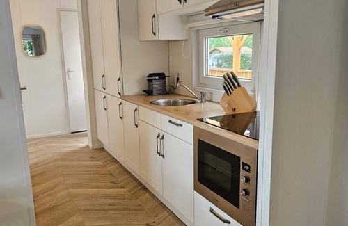 Sevenum Chalet De Esquí | Luxury chalet on 5-star campsite with spacious veranda