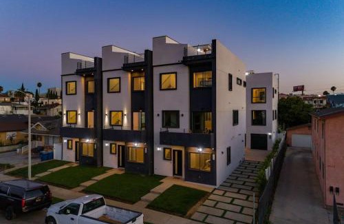 Mid City Villa | Luxury Modern 4 Bedroom 3 Bathroom Home with Rooftop Deck #1