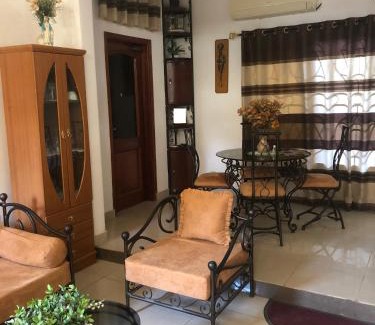 Porto-Novo Apartamento | MAISON MEUBLEE SUR LE CINQUANTENAIRE.