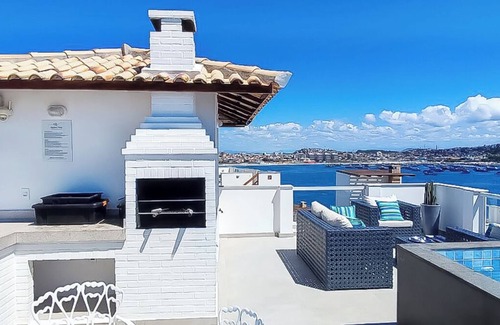 Arraial do Cabo Apartamento | Marbella Suite, sea view, pool and private barbecue.