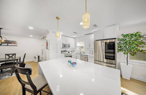 Carrollwood Casa | Fun Oasis! Private Pool, Hammock, Golf, Grill, and Arcade!
