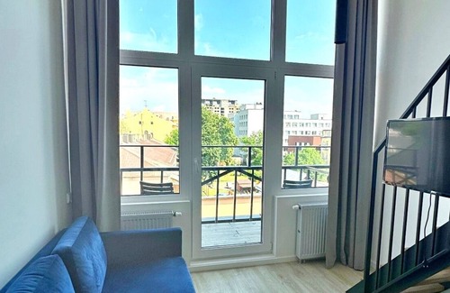 Liberty Avenue Apartamento | Mini Loft 1 BD Apt by Hostlovers