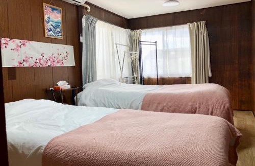 Hikone Villa | Minpaku SAKURA 民泊 戸建貸切 彦根城まで車10分 無料駐車場 普通2台小型1台