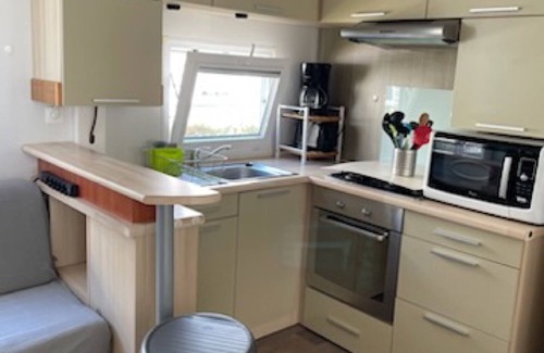 Les Moutiers-en-Retz Alquiler De RV | Mobil-home 'Mobil-home Kapa - Proche Mer' con piscina compartida, terraza privada y jardín privado