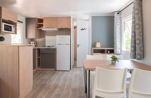 Bretagne-d'Armagnac Alquiler De RV | Mobilhome 'Mobilhome Confort 4 Personnes 63' con terraza privada, jardín privado y Wi-Fi