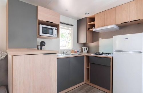 Bretagne-d'Armagnac Alquiler De RV | Mobilhome 'Mobilhome Confort 4 Personnes 63' con terraza privada, jardín privado y Wi-Fi
