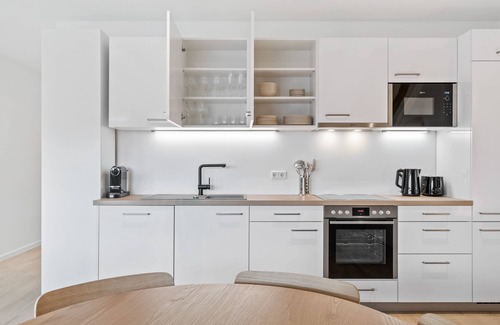 Roeser Apartamento | Modern 2BR Apartment: Balcony, Wi-Fi, Free Parking