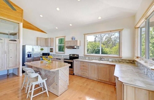 Longbeach Village Casa | Retiro frente al mar tropical en el histórico pueblo de Longboat