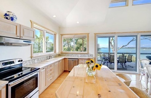 Longbeach Village Casa | Retiro frente al mar tropical en el histórico pueblo de Longboat