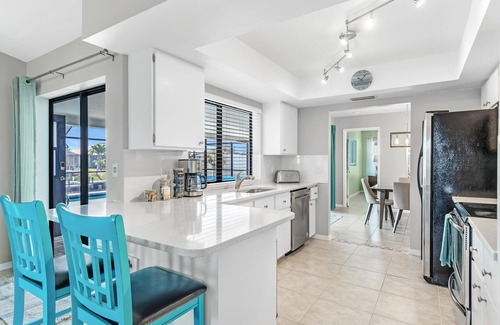 Cape Coral Casa | Modern Coastal Home w/Heated Pool & Waterfront Views!