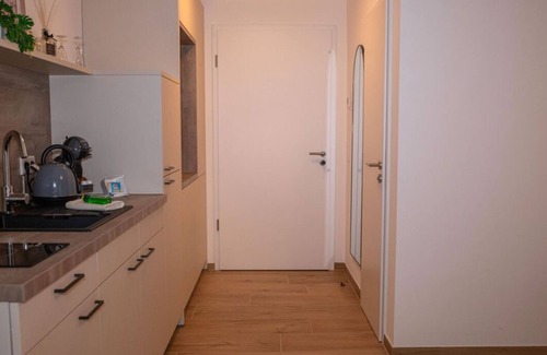 Jollenbeck Condominio | Modern cozy purple apartment