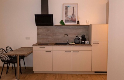 Jollenbeck Condominio | Modern cozy purple apartment