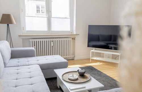 Holzwickede Apartamento | Modern home: Airport 2km | Kitchen with island | Disney+ | Speedport