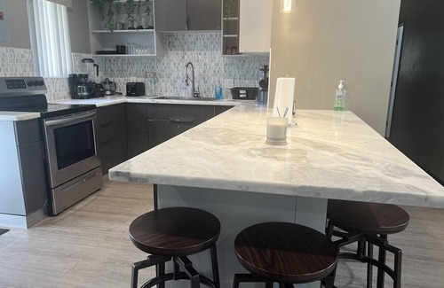 Miami Gardens Casa | Modern Home in Miami Gardens with Gazebo, Fire Pit, and Pool