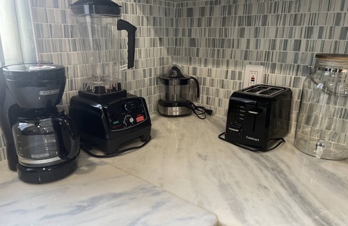 Miami Gardens Casa | Modern Home in Miami Gardens with Gazebo, Fire Pit, and Pool