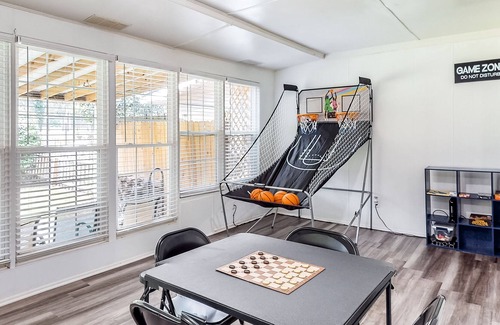 Gracewood Casa | Modern home with a game room, washer/dryer, AC, covered patio, & large yard