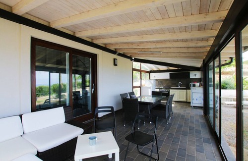 Campofelice di Roccella Villa | Villa moderna, práctica de golf, piscina, jardín, terraza, Wi-Fi, vista al mar