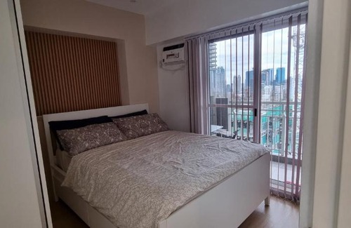 Kapitolyo Apartamento | Modern Muji themed 2-bedroom condo