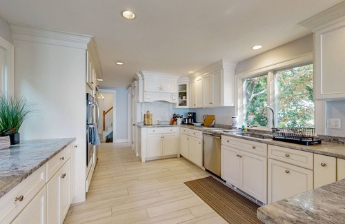 Gloucester Casa | Modern oceanfront home with scenic deck, grill, games, chef's kitchen, & W/D