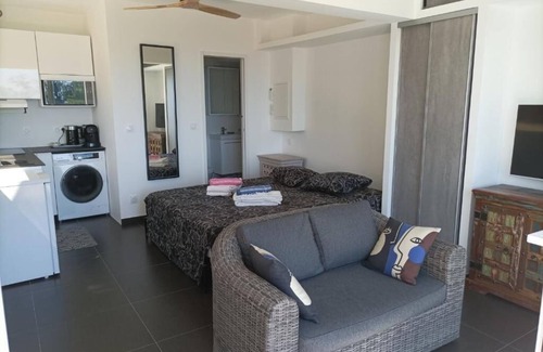 Furiani Apartamento | Modern studio with magnificent sea view in a quiet, leafy setting