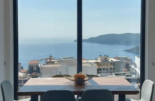 Becici Apartamento | Modern Top Floor Sea View 3BR with Pools, Spa & Fitness