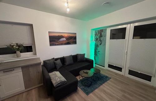 Schiffdorferdamm Apartamento | Moderne Ferienwohnung Green Garden mit Garten und Stellplatz