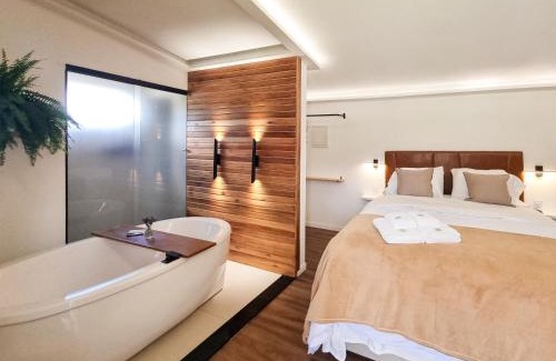 Espera Feliz Casa | Monte Paraíso - banheira e vista da Pedra Menina