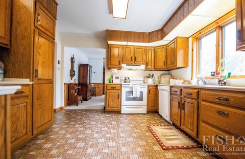 Laporte Casa | "Mulrooney's" es una casa estilo rancho que ofrece todo en el nivel principal en Lake Mokoma