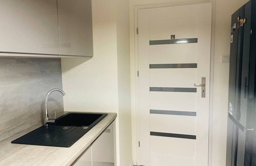 Bialoleka Apartamento | MyCondo Fashion District apartment with garage