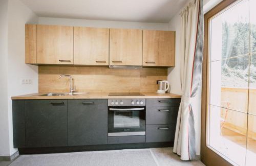 Schmirn Apartamento | Nedererhof - Zimmer Enzian mit Gemeinschaftsküche