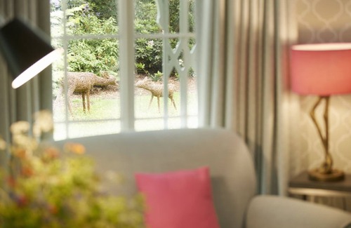 Weston Under Lizard Cabaña | Nestled in the depths of Temple Wood, Pink Cottage is a unique, romantic retreat sleeping two guests