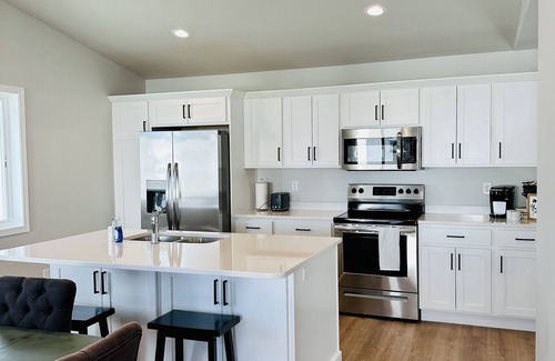 Fargo Casa | NEW family- friendly 3 bedrm home in West Fargo with space to gather and relax.