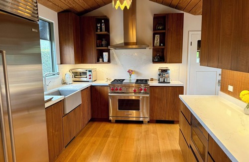 North of Wilshire Casa | New listing! 3 bd Spanish gem in Brentwood with courtyards & front/back yards.