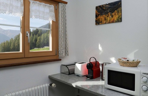 Frauenkirch Apartamento | Acogedor apartamento para 3 personas con WIFI, TV, terraza y vista panorámica