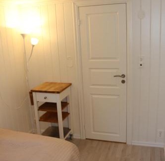 Oslo Apartamento | Nice Apartment with1 bedroom Separate living room with a sofa bed and a tiny kitchen a bathroom located in Nordstrand near by the Sea for 3 guests with a garden and grill with sea view just outside the apartment
