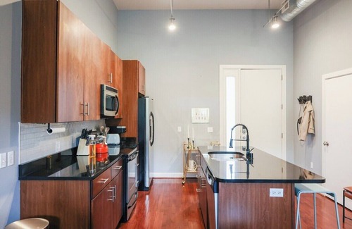 East Market District Condominio | NuLu Condo in Walkable Area + FREE Gated Parking + King Bed + BEST Location!