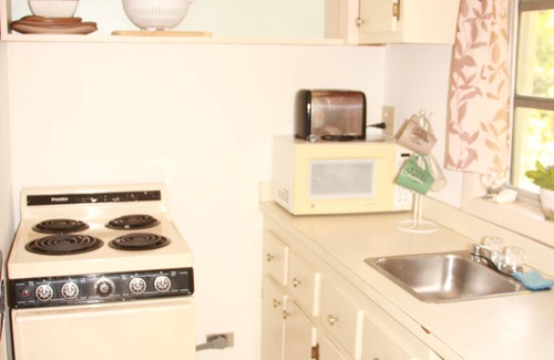 Governor's Harbour Cabaña | Ocean Sounds Cottage - 5 minutos a pie de la playa de Twin Coves