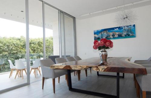 Playacar Apartamento | Ocean View Pool in Exclusive Playacar, En-Suite Rooms