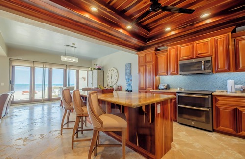 Boca Ciega Condominio | Ocean’s Edge 1A – Ground-Floor Beachfront Condo on Ambergris Caye
