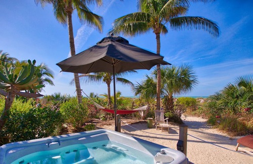 Wulfert Cabaña | Old Florida Beach Cottage, traiga a su perro, EN LA playa, observe las estrellas en la hamaca