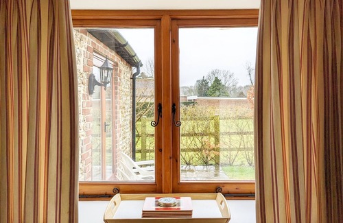 East Lavant Cabaña | Granero convertido establece en el hermoso campo de West Sussex.