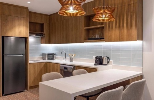 Garhoud Casa | One Bedroom King Suite Near DXB Airport By Luxury Bookings