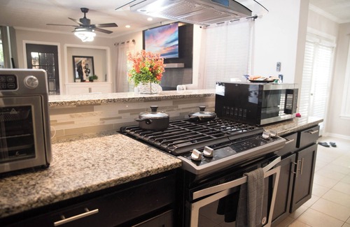 Sandtown Casa | Orange Oasis Villa Indoor Fireplace Garage Firepit BBQ grill near EVERYTHING!