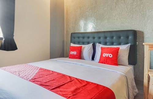 South Tangerang Hotel | OYO 90305 De Umbrela Mansion Syari'ah Ciputat