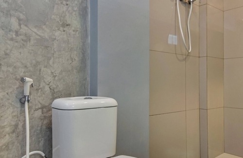 South Tangerang Hotel | OYO 90305 De Umbrela Mansion Syari'ah Ciputat