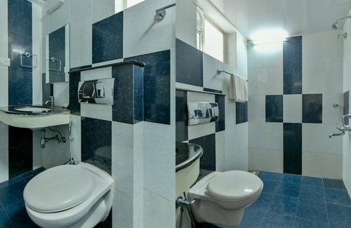 Thiruvananthapuram Hotel | OYO Flagship 10051 Hotel Tyche Stays