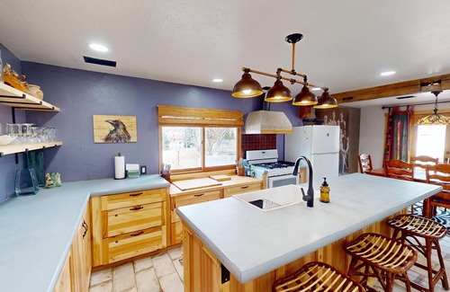 Spanish Valley Cabina | Pack Creek ~ Meadow House: Boho mountain oasis with fireplace, patio views, and stargazing bed