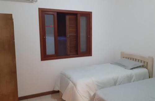 Pinheira Casa | Partiu Praia SC- Piscina, Ar condicionado, wi-fi, duas quadras da praia e centrinho